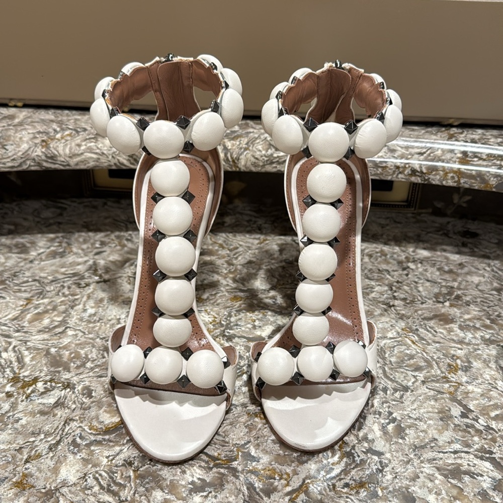 ALAIA
La Bombe Stud Ankle-Wrap Stiletto Sandals
